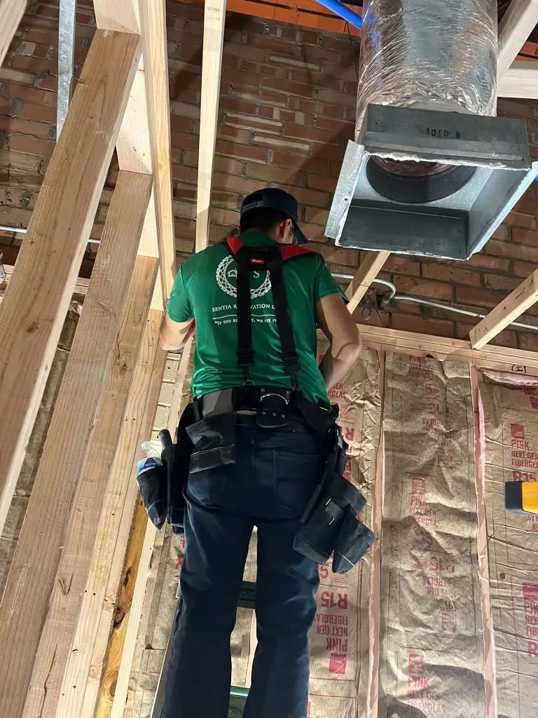 Sentia Renovation team member working on residential framing